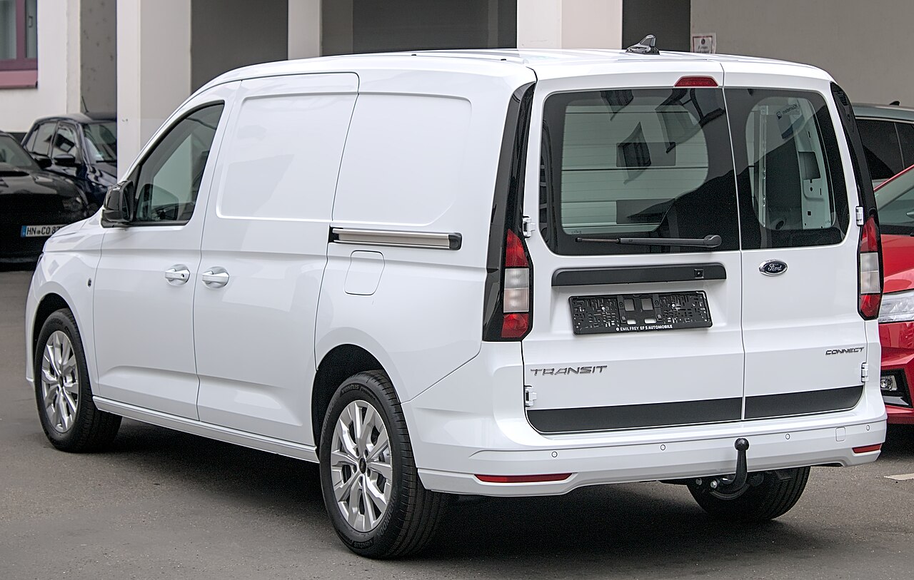 White van ready to carry boxes for a student move